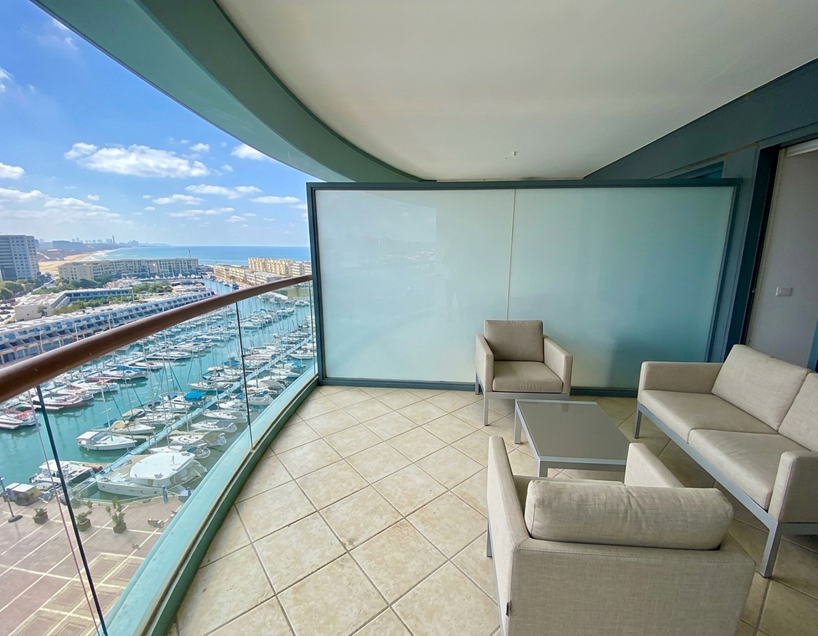 Wide sun terrace overlooking the marina and the Mediterranean